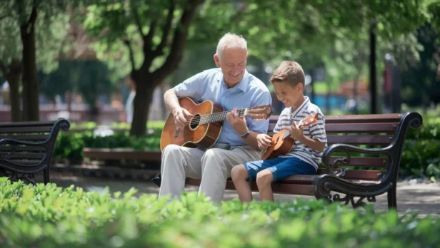 a-photo-of-an-elderly-man-and-a-young-boy-playing–pldO_8DOTjyYWoz4SV7ffg-6zB3SooYQWuxYwhMBAbIUg